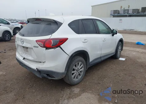 2014 Mazda Cx-5 Touring z USA, uszkodzony, nr VIN JM3KE2CY9E0318849